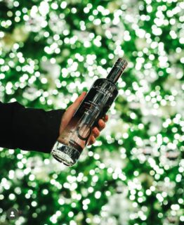 Passing a bottle. Sharing a moment. Letting the glow of the season do the rest.  Time well spent, together. #organicmoments #holidayspirits